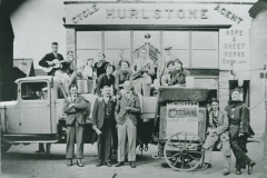002608 Carnival group on lorry outside Hurlestone's, Ilminster featuring H Frost, A Upham, A Long, C Baker, G Huish, J Swain, T Hodder, E Dade, M Dade, D Legg, J Harris, P Dunster, J Gosling, E Dade, L Westcott, P Rogers and H Hull 1937