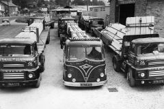 002996 M S Small lorries loaded with concrete beams c1965
