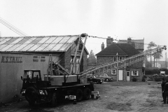 002999 Drivers receiving instruction on operation of new crane in M S Small's yard c1965