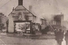 000041 Fire at Samways, Triangle, Ilminster showing attempts to put the fire out 1914