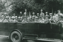 002036 Group in charabanc owned by R Patten of Ilminster, for outing to Gough's Caves, Cheddar c1920